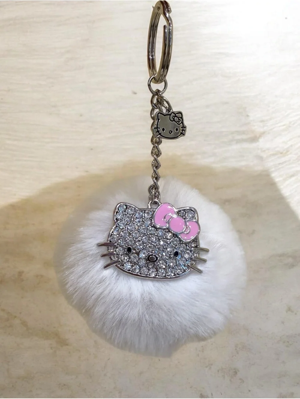 Hello Kitty White Faux Fur Pom with Pink Bow and Rhinestone Face Keychain